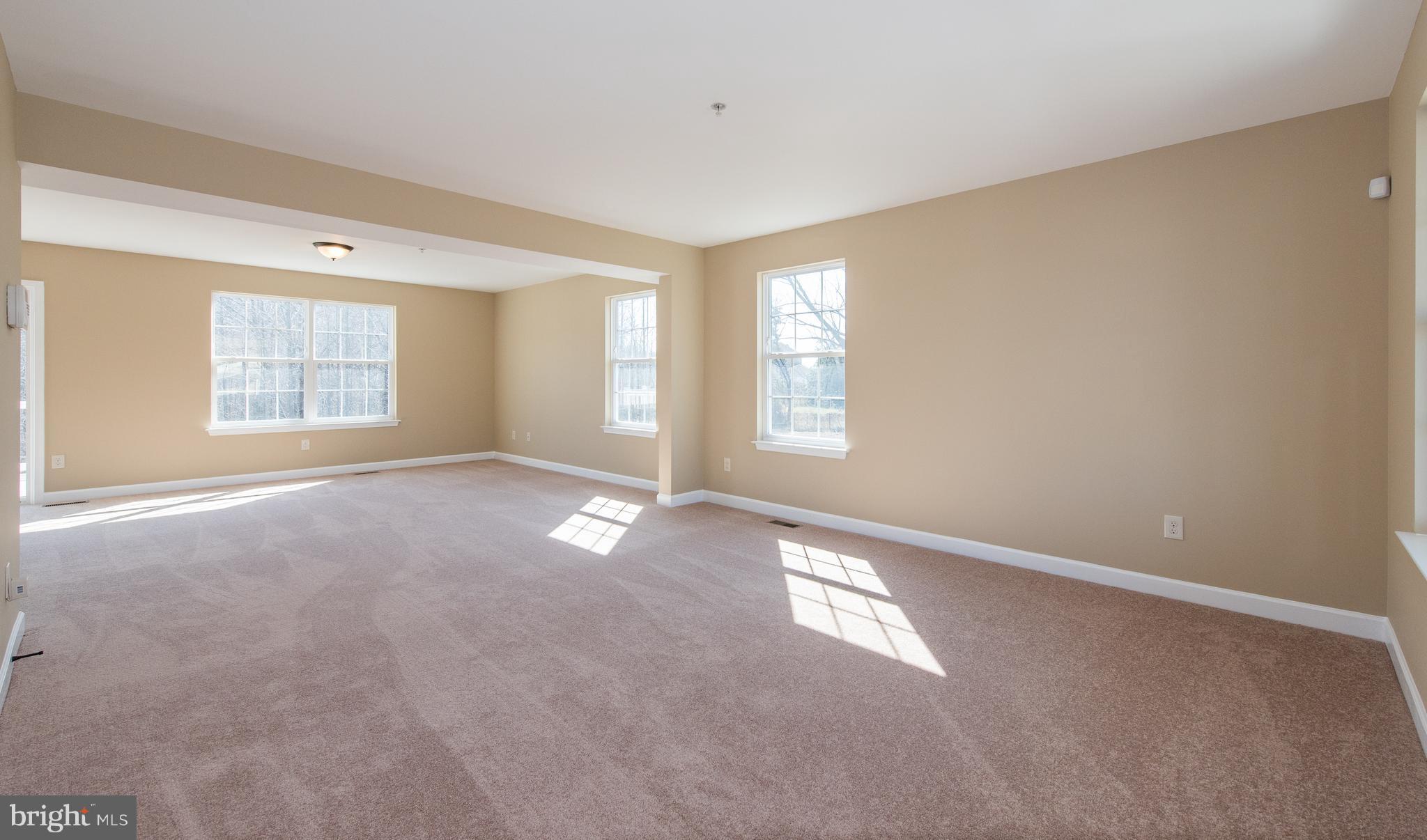 1005 Wampler Road Baltimore, MD 21220 - Photo 5 of 30 a view of an empty room with a window