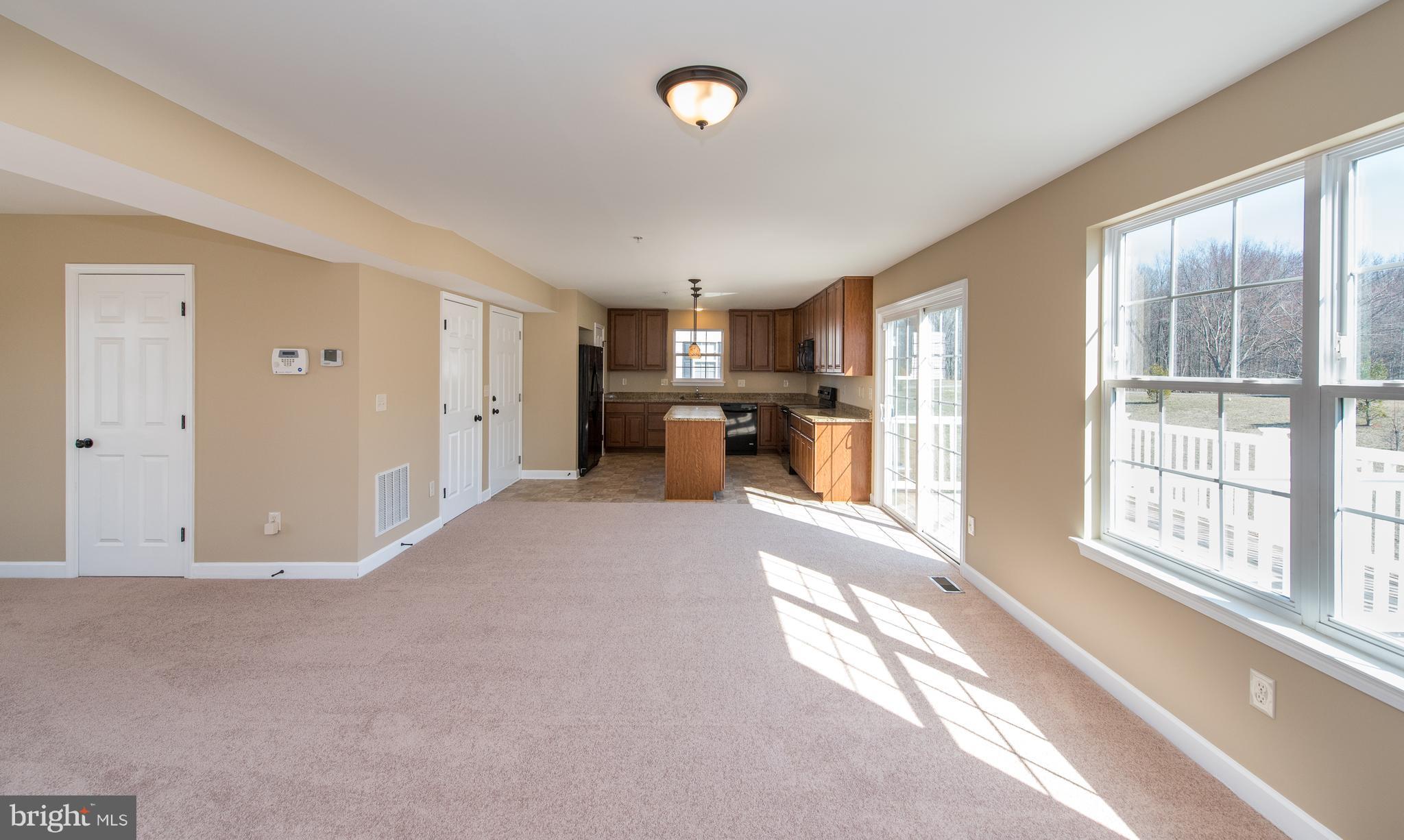1005 Wampler Road Baltimore, MD 21220 - Photo 7 of 30 a view of a kitchen with a sink and a large window