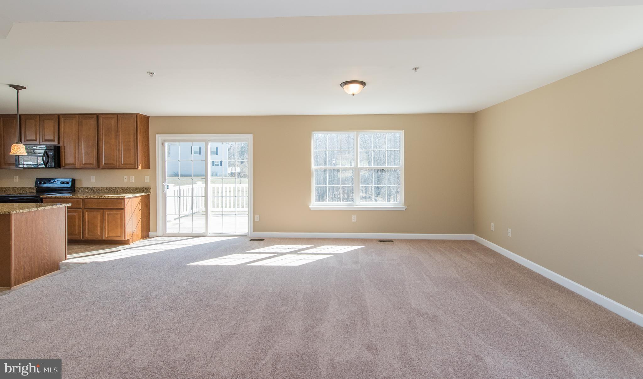 1005 Wampler Road Baltimore, MD 21220 - Photo 8 of 30 a view of an empty room with a window