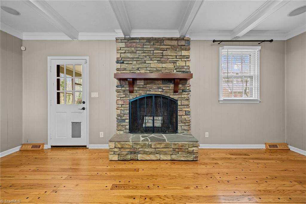 6922 Maynard Road Summerfield, NC 27358 - Photo 13 of 49 Fireplace in great room - could be gas logs or wood burning