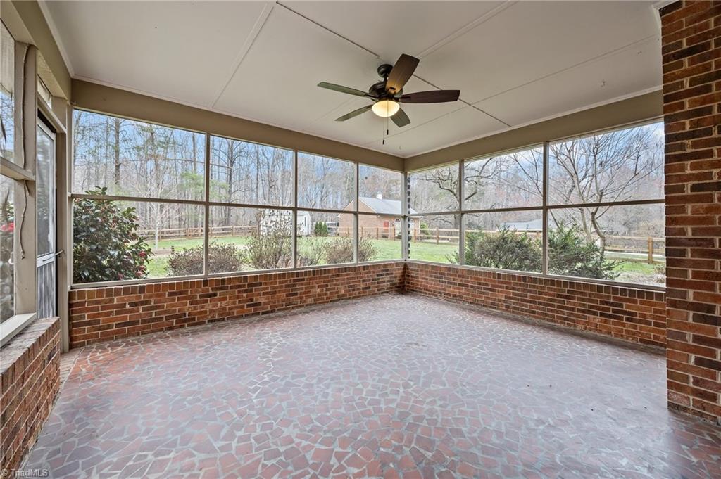 6922 Maynard Road Summerfield, NC 27358 - Photo 34 of 49 Screened-in porch
