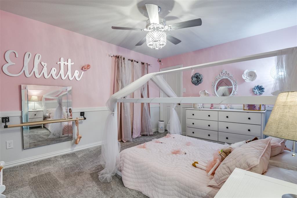 2419 Lalun Lane Forney, TX 75126 - Photo 21 of 25 a view of a bedroom with furniture