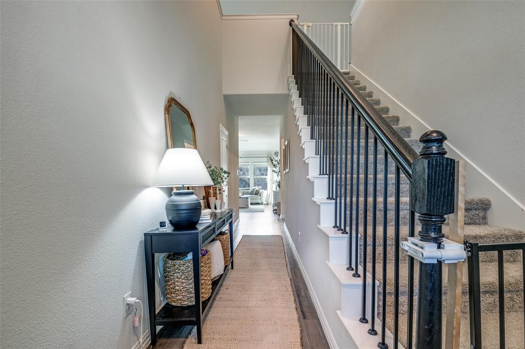 2419 Lalun Lane Forney, TX 75126 - Photo 5 of 25 a view of a hallway with staircase