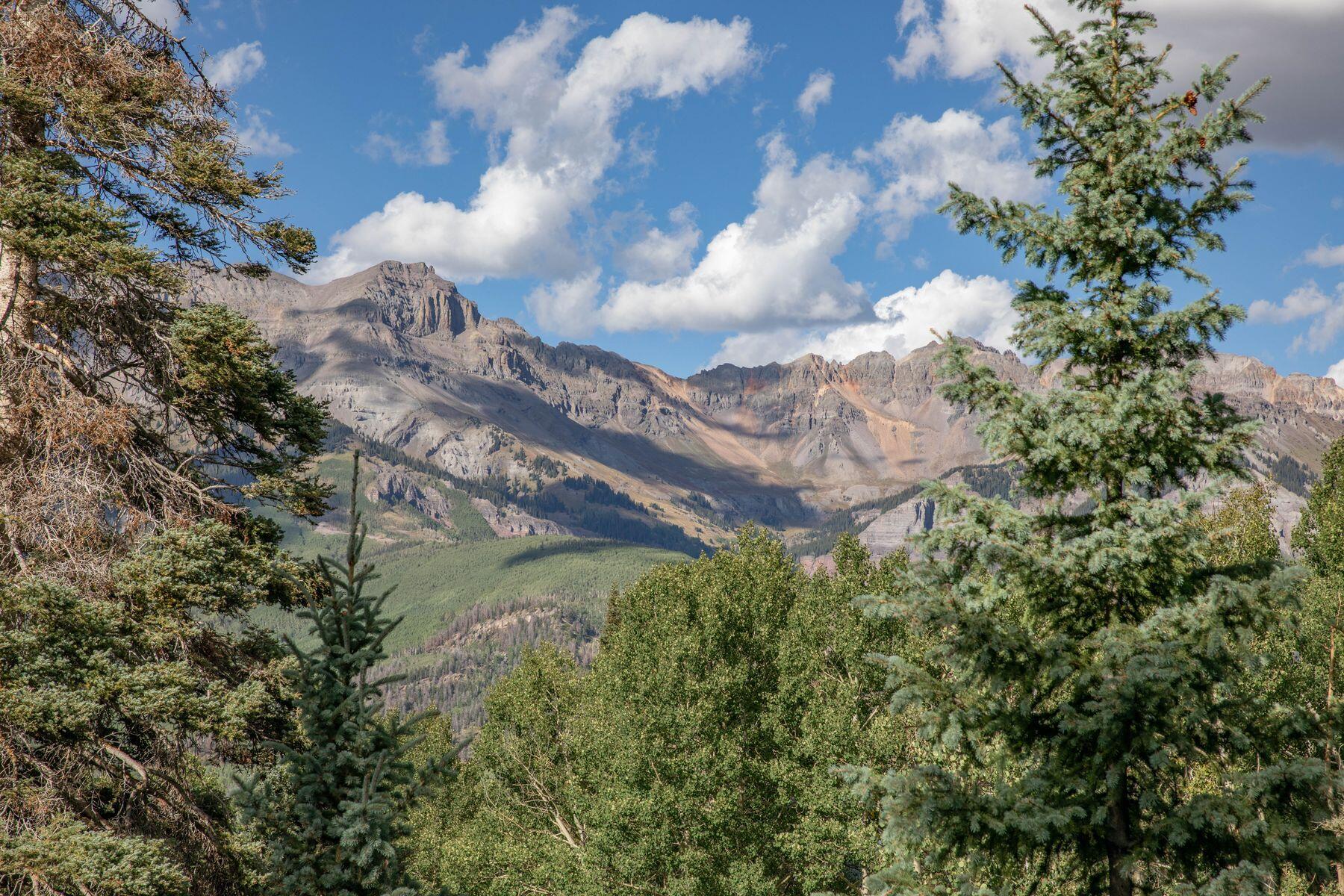 a view of a houses with a yard