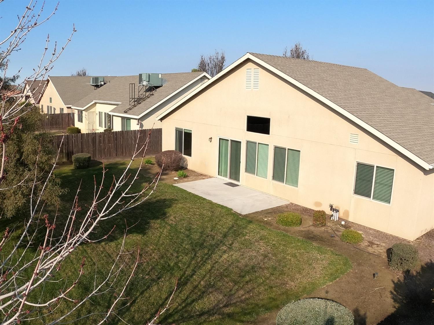 941 Marc Avenue Fowler, CA 93625 - Photo 11 of 11 a house view with a backyard space