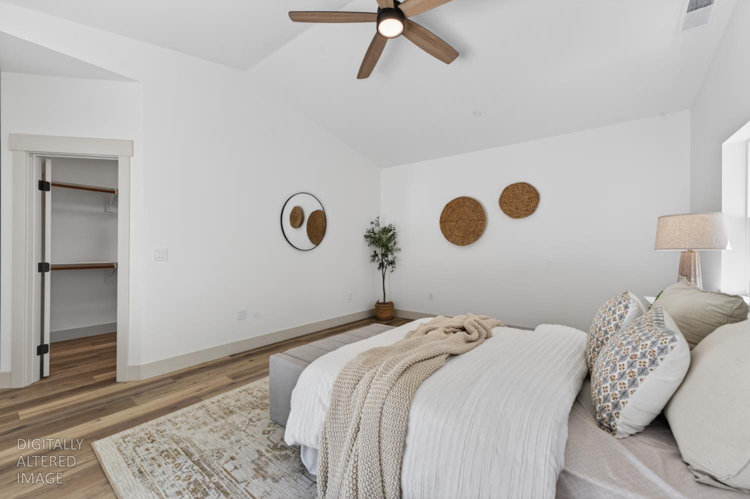 280 Jan Road Grass Valley, CA 95945 - Photo 26 of 66 a bedroom with a bed and a lamp on the dresser