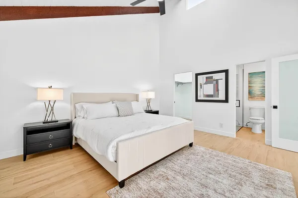 a white bath tub sitting next to a white sink