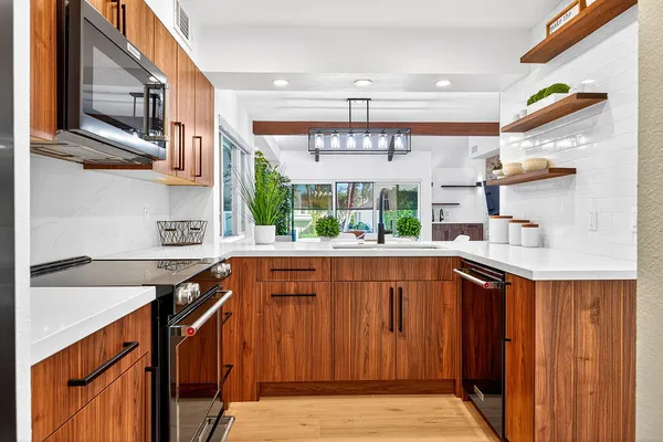 a bedroom with a bed and a night stand