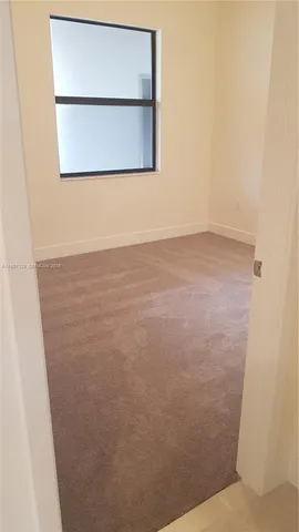 a bathroom with a toilet a sink and a bathtub