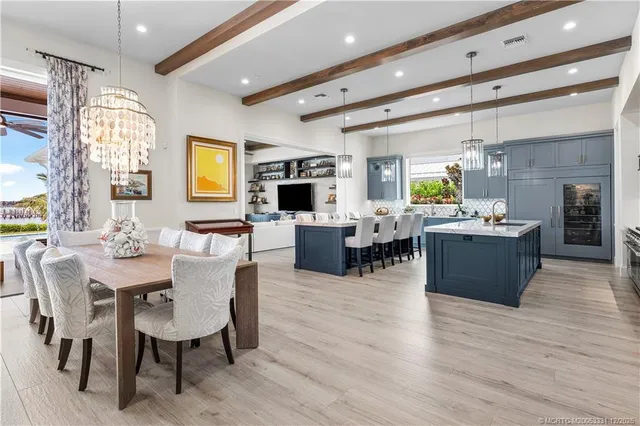 a view of a livingroom with couch and a flat screen tv