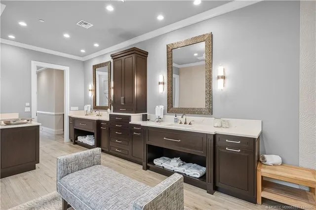 a view of house and swimming pool with furniture