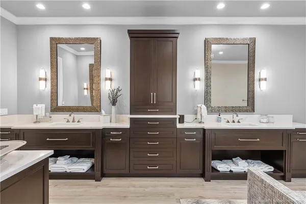 a view of swimming pool with outdoor seating and city view