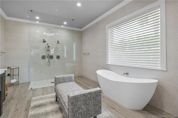 a view of a patio with couches and potted plants