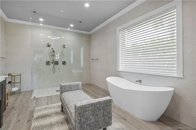 a view of a patio with couches and potted plants