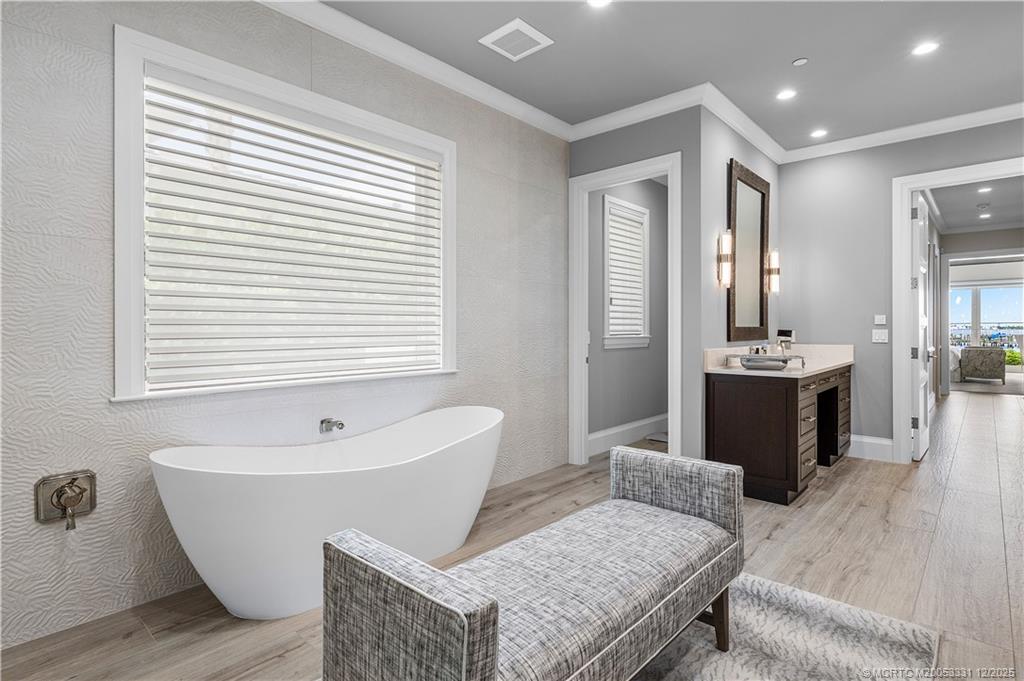 2842 Southwest Rivers End Way Palm City, FL 34990 - Photo 41 of 99 a view of a double vanity sink and a window