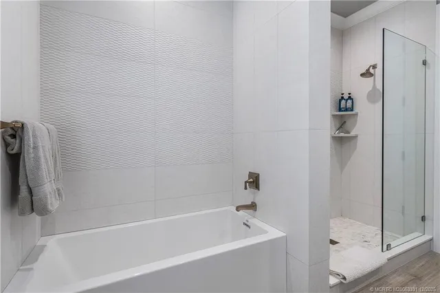 an aerial view of a house with outdoor space