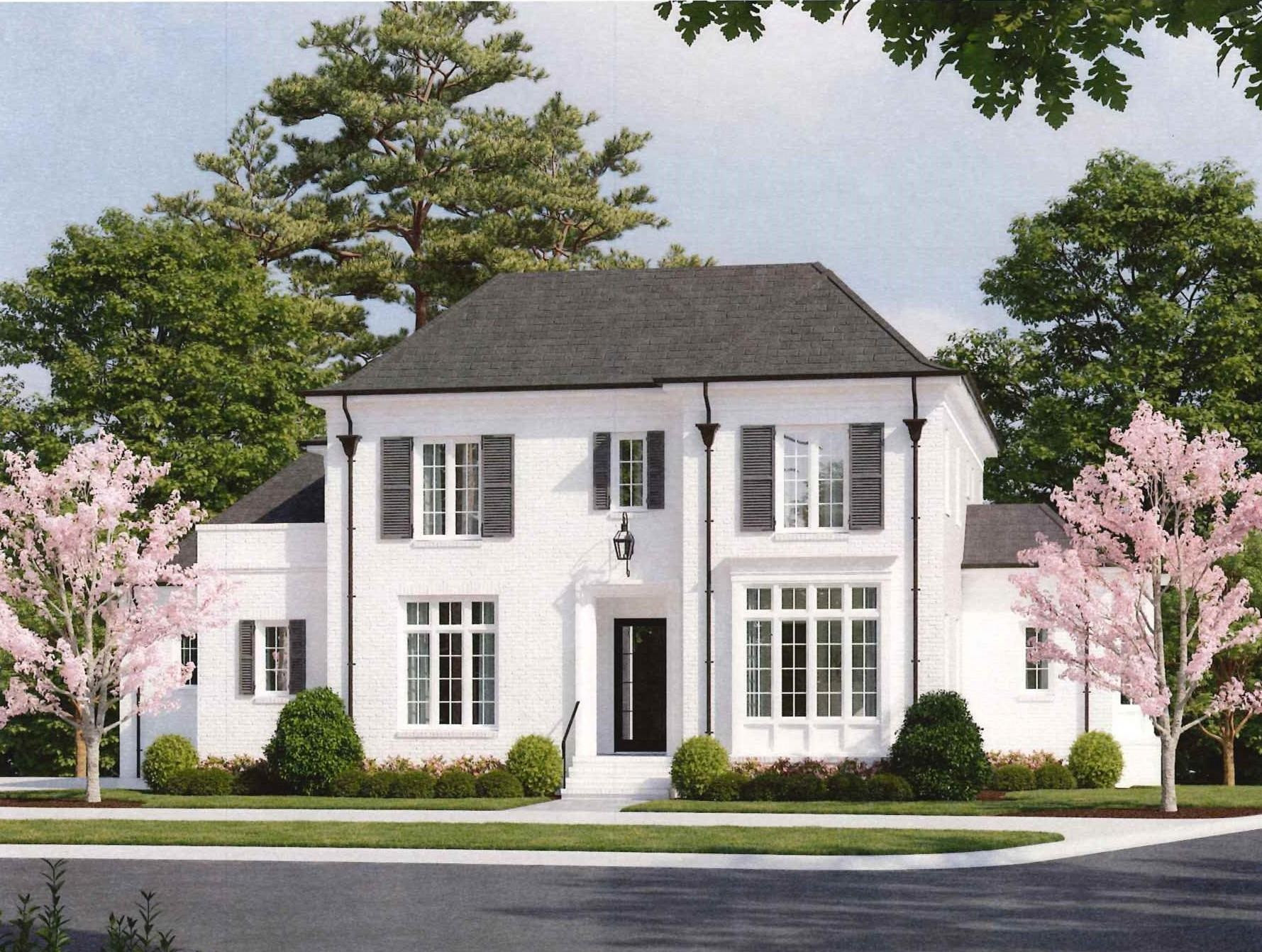 3205 Oak Grove Circle Raleigh, NC 27607 - Photo 1 of 3 a front view of a house with a yard