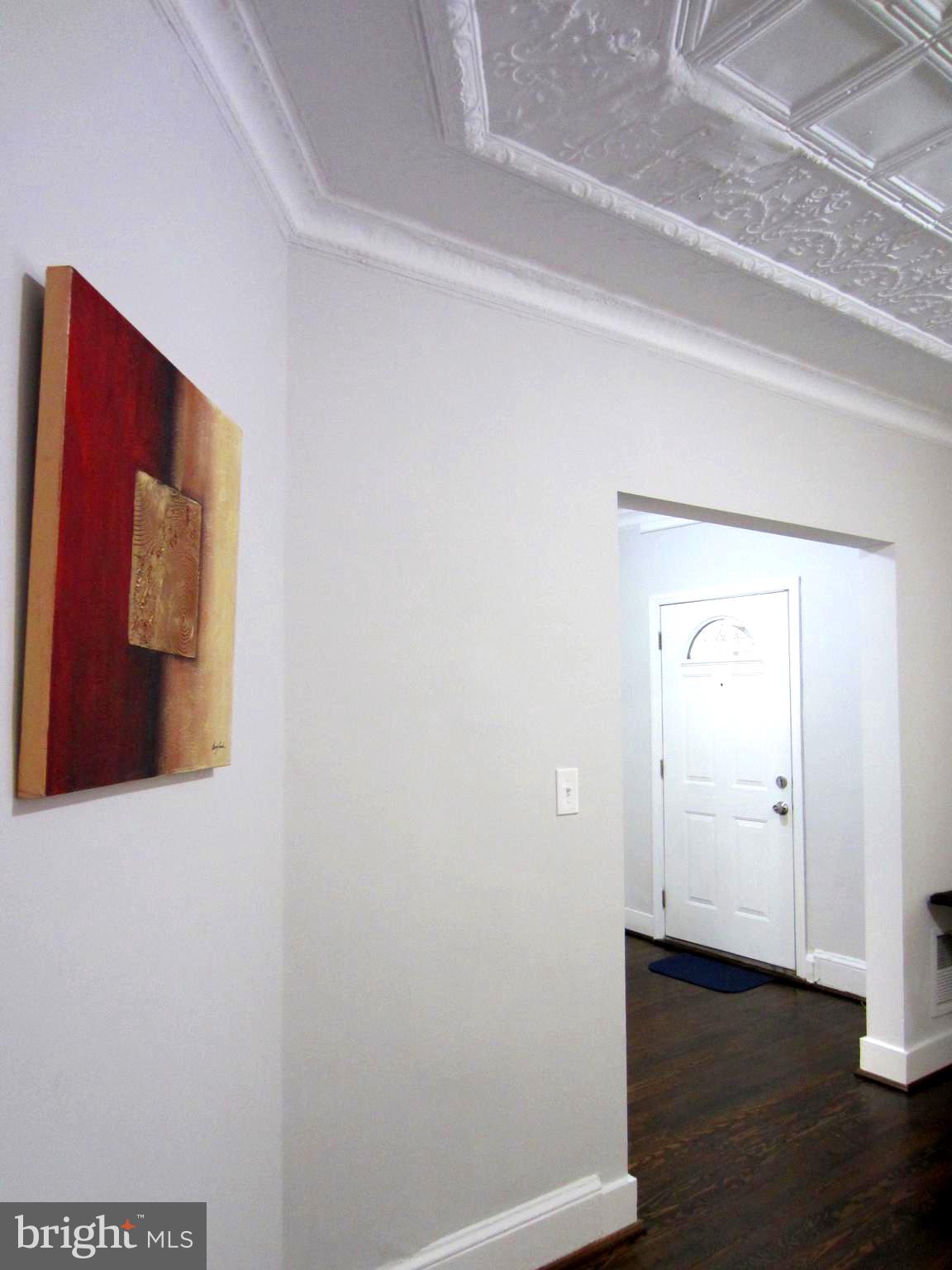 607 Columbia Road Northwest Washington, DC 20001 - Photo 13 of 48 Living room looking towards front foyer