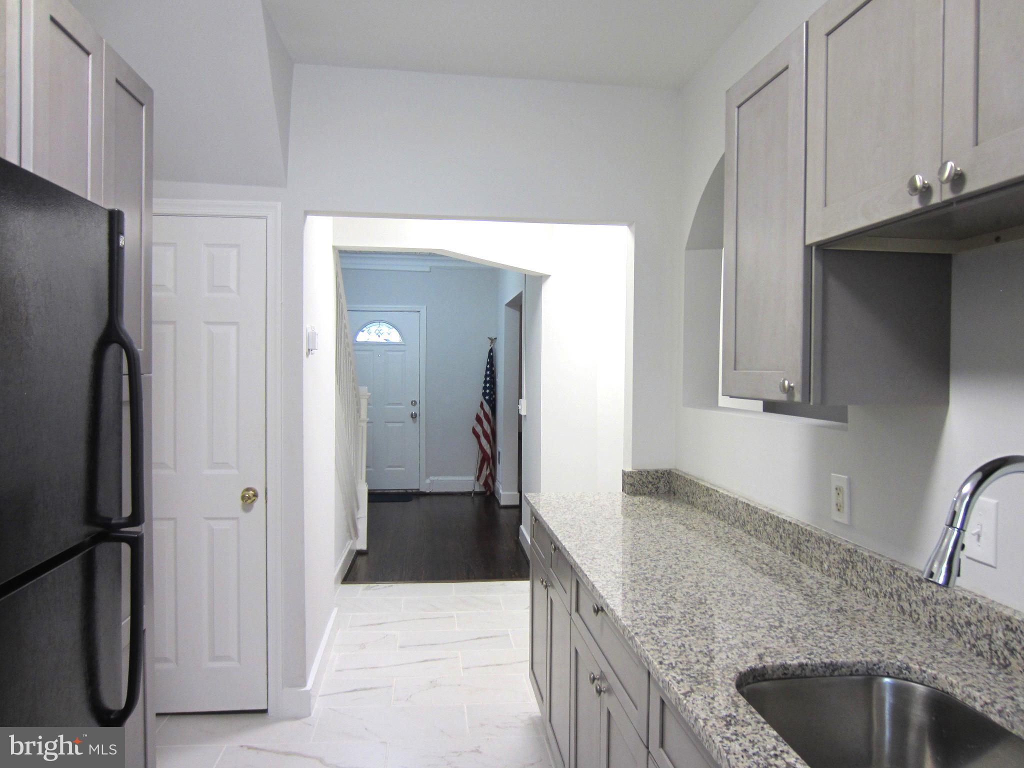 607 Columbia Road Northwest Washington, DC 20001 - Photo 21 of 48 Kitchen looking towards front foyer & central hall