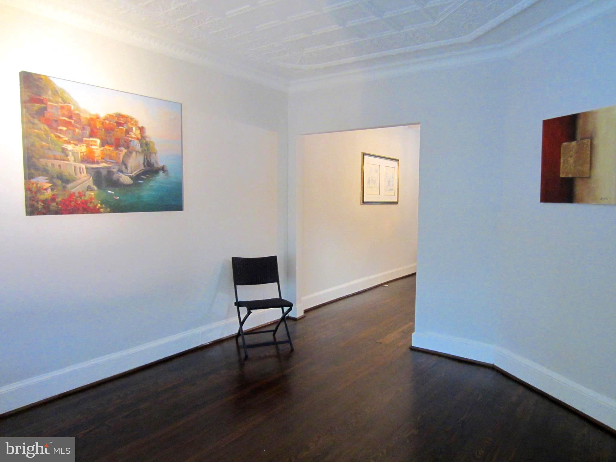 607 Columbia Road Northwest Washington, DC 20001 - Photo 8 of 48 Living room with high ceilings and elegant ceiling