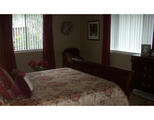 130 Mountain Gate Road, Unit 130 Ashland, MA 01721 - Photo 9 of 12 a black and white photo of a room