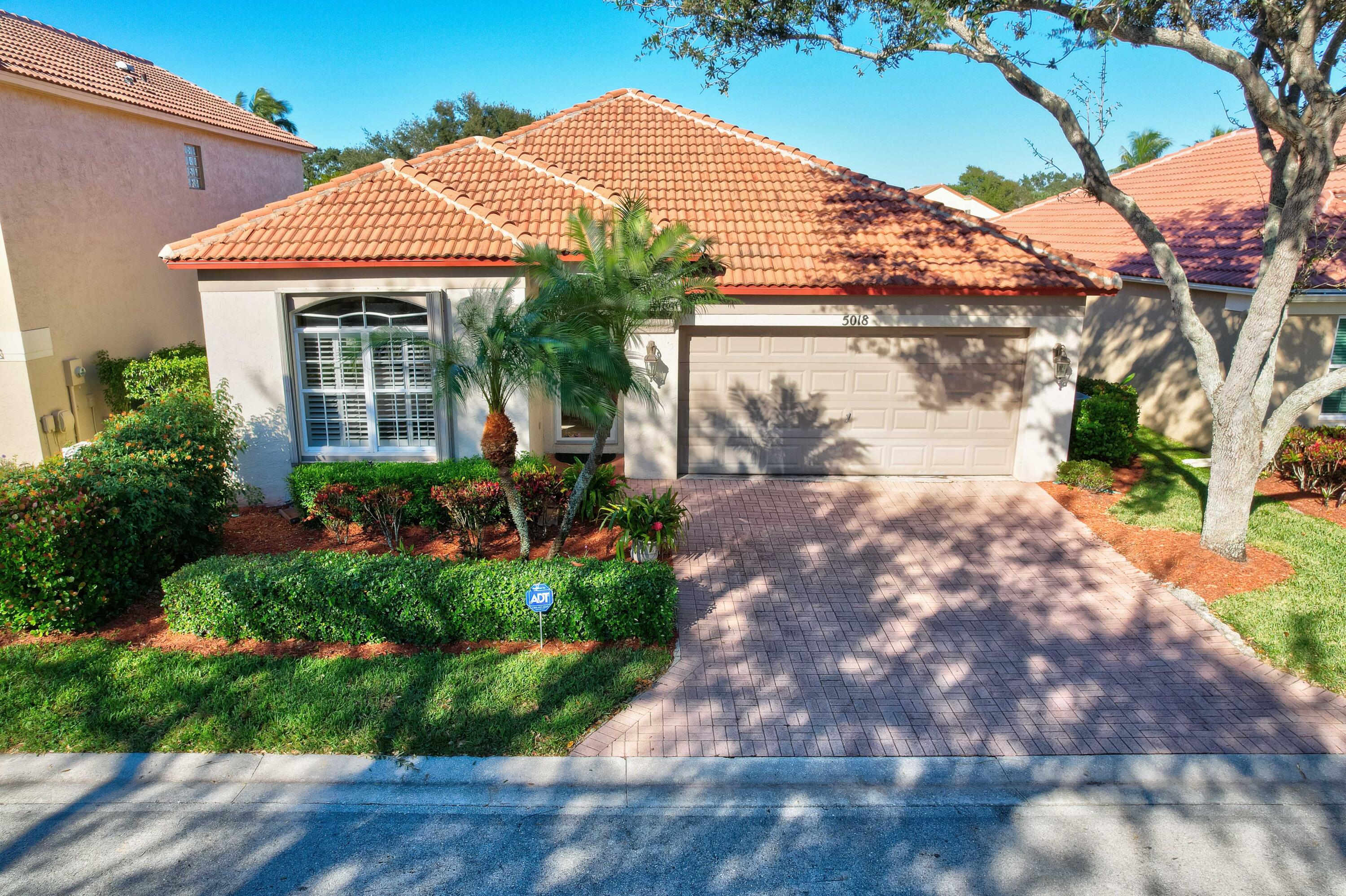5018 Elpine Way Riviera Beach, FL 33418 - Photo 1 of 46 Front