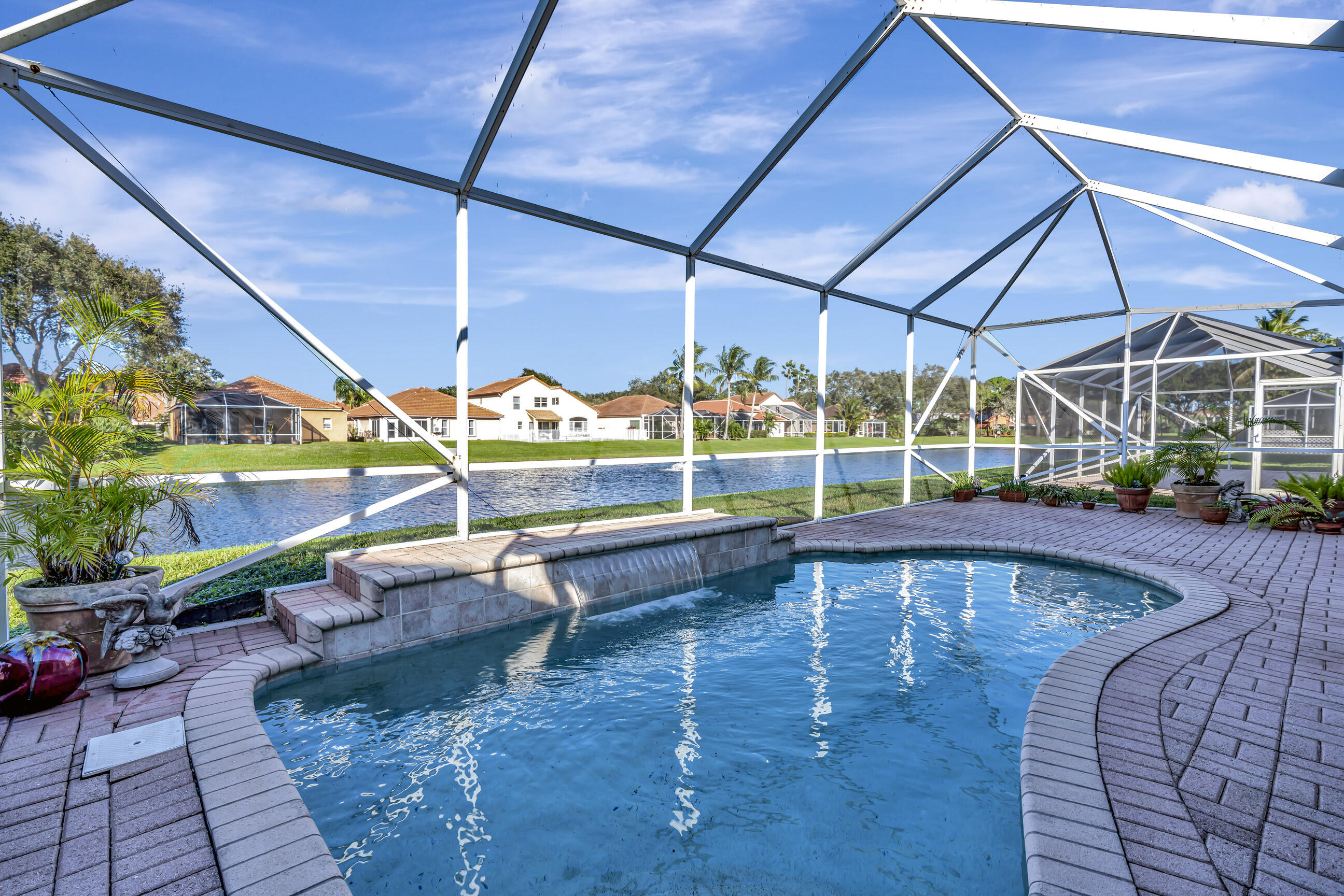 5018 Elpine Way Riviera Beach, FL 33418 - Photo 31 of 46 Screened in pool/lanai