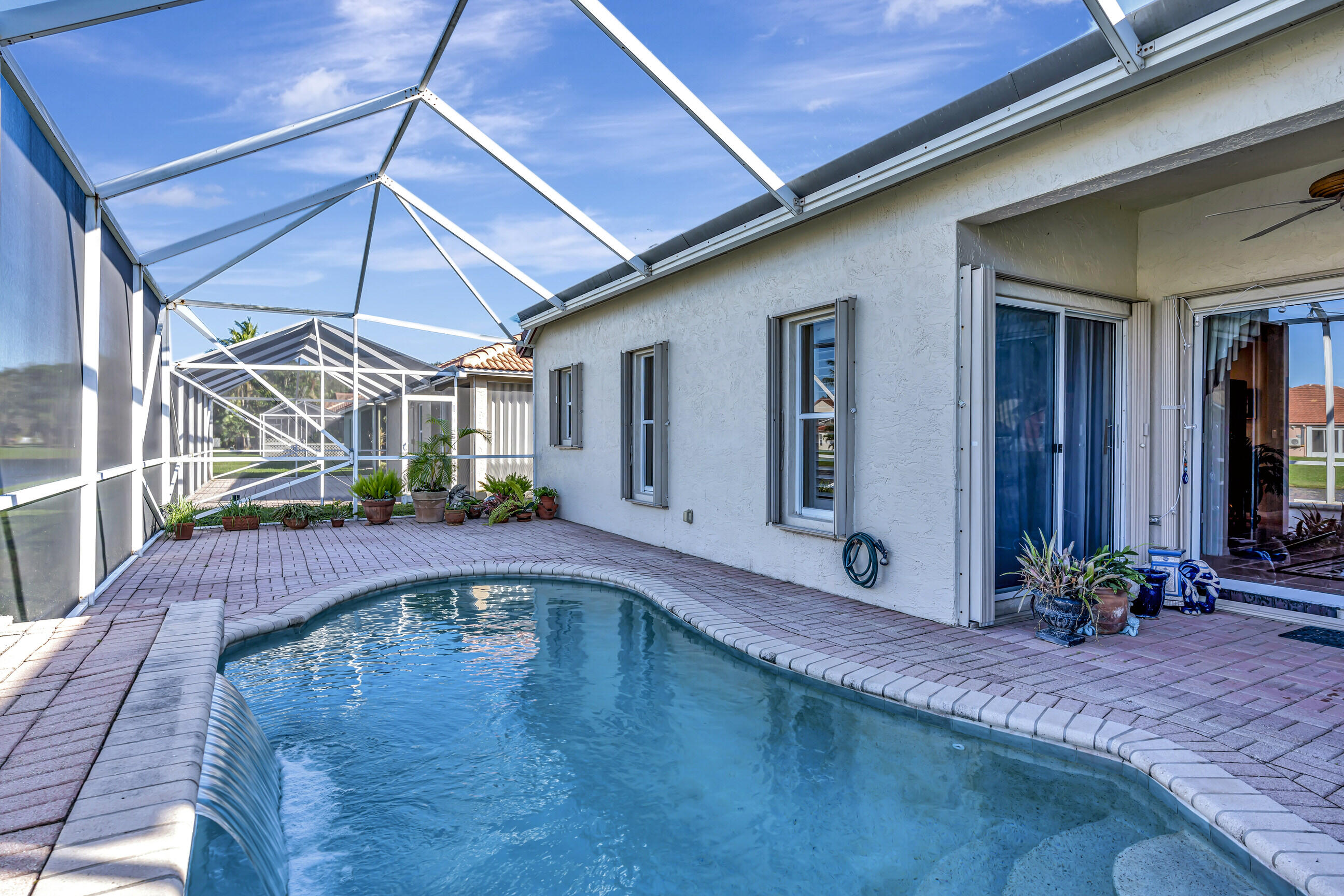 5018 Elpine Way Riviera Beach, FL 33418 - Photo 32 of 46 Screened in pool