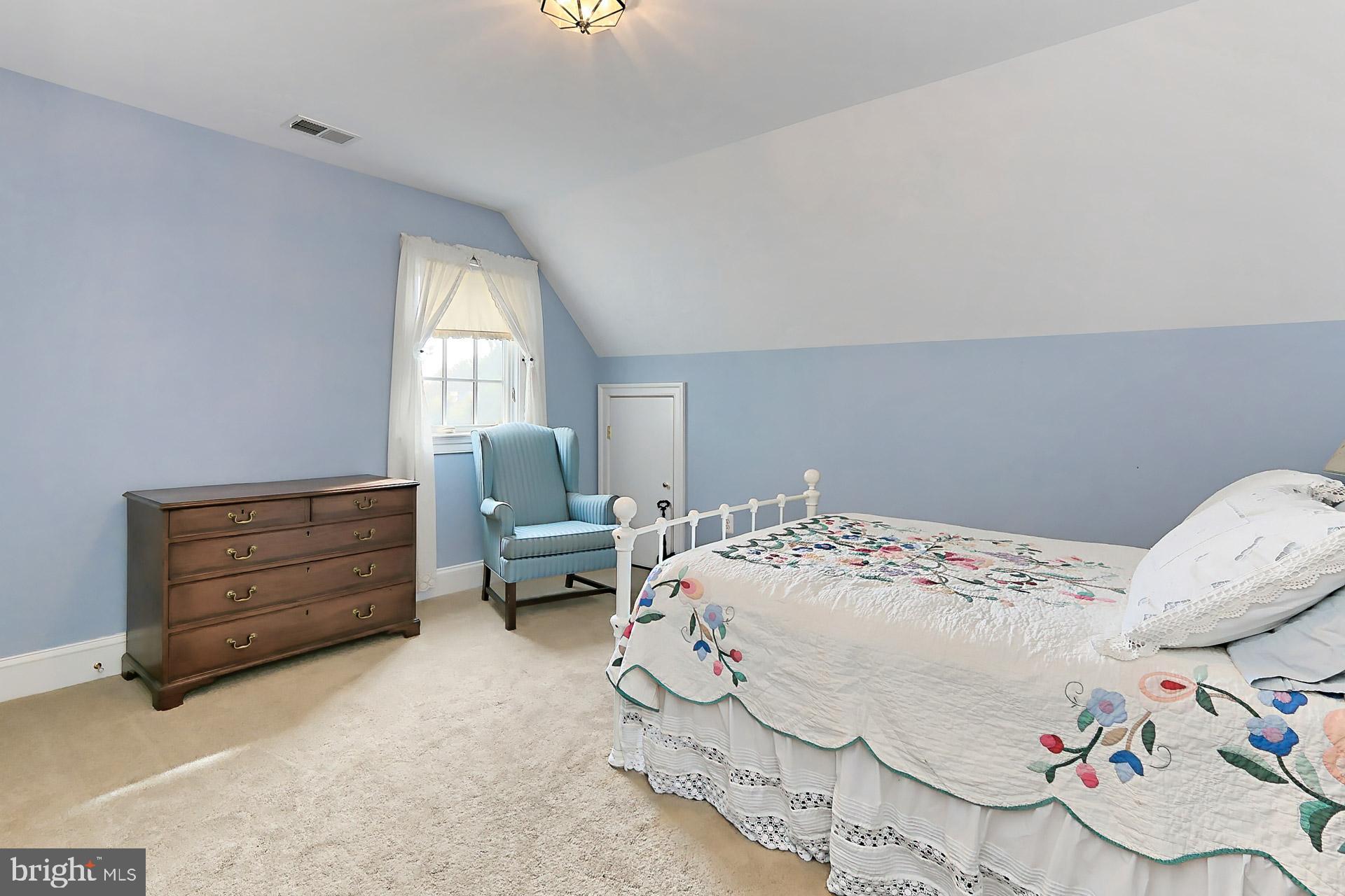 11208 West Montpelier Road Great Falls, VA 22066 - Photo 40 of 77 a bed room with a bed and a window
