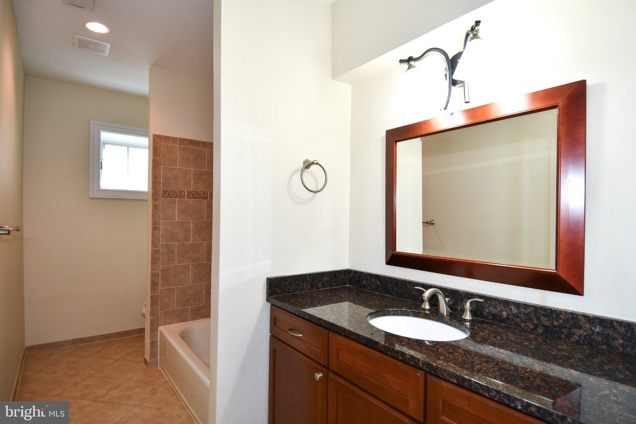1924 Leonard Road Falls Church, VA 22043 - Photo 54 of 61 Elegant bathroom with modern finishes.