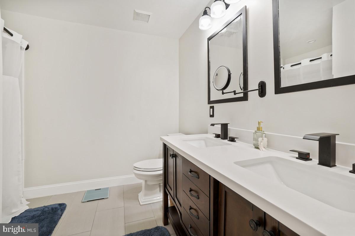 1515 Church Hill Place Reston, VA 20194 - Photo 21 of 28 Double vanity in primary ensuite is updated