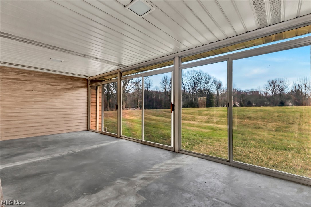 18230 Egbert Road Walton Hills, OH 44146 - Photo 11 of 34 Sun room located off the dining area