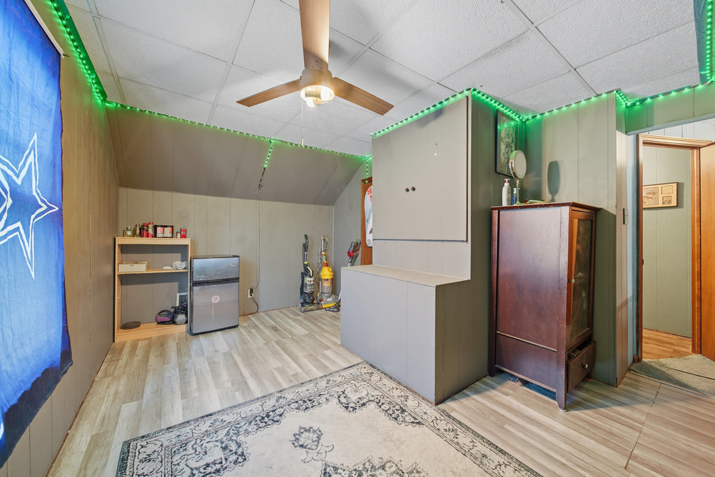 2616 Ridge Road Lansing, IL 60438 - Photo 12 of 25 a kitchen with stainless steel appliances a refrigerator and a wooden floor