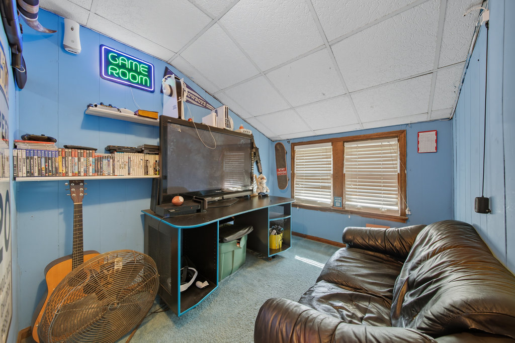 2616 Ridge Road Lansing, IL 60438 - Photo 13 of 25 a living room with furniture and a flat screen tv