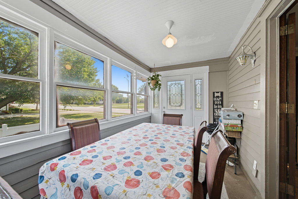 2616 Ridge Road Lansing, IL 60438 - Photo 8 of 25 a bedroom with a bed and a large window with the outer view