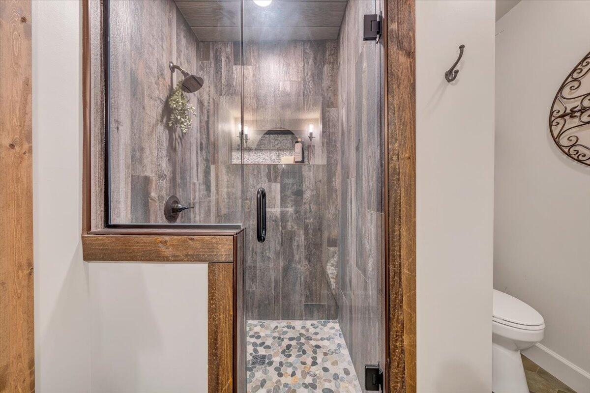 3851 Joppa Mill Road Moneta, VA 24121 - Photo 49 of 104 a bathroom with a shower and a toilet