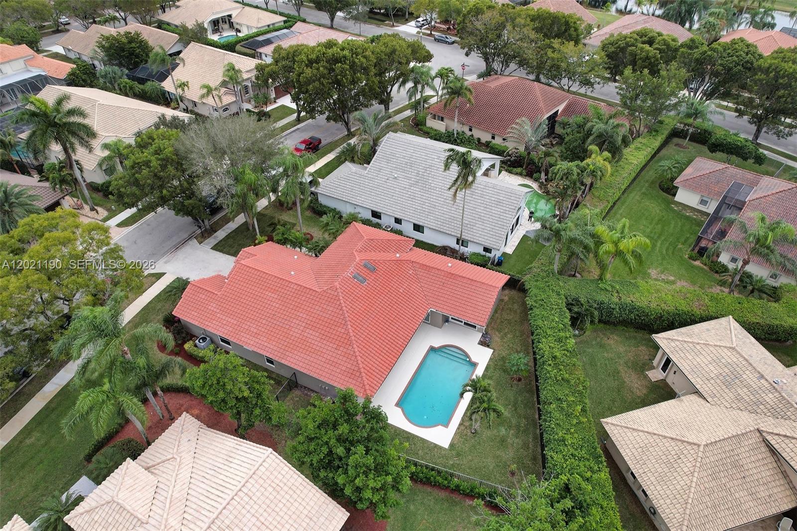 814 Heron Road Weston, FL 33326 - Photo 2 of 27 an aerial view of house with swimming pool outdoor seating and yard