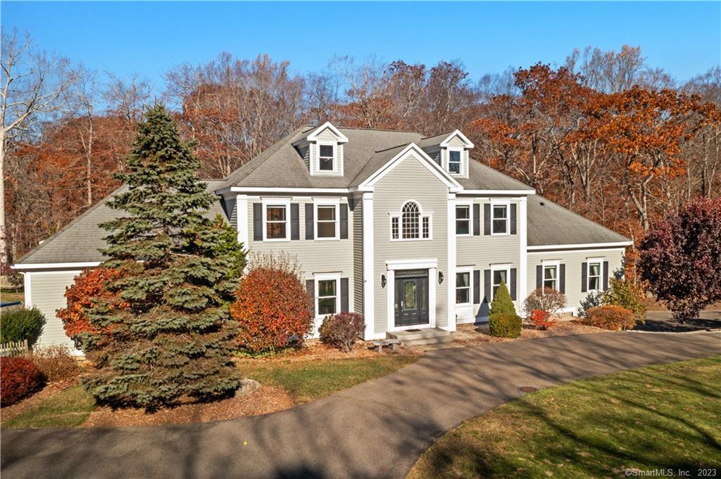 63 Riverside Terrace Madison, CT 06443 - Photo 1 of 1 a front view of a house with a yard