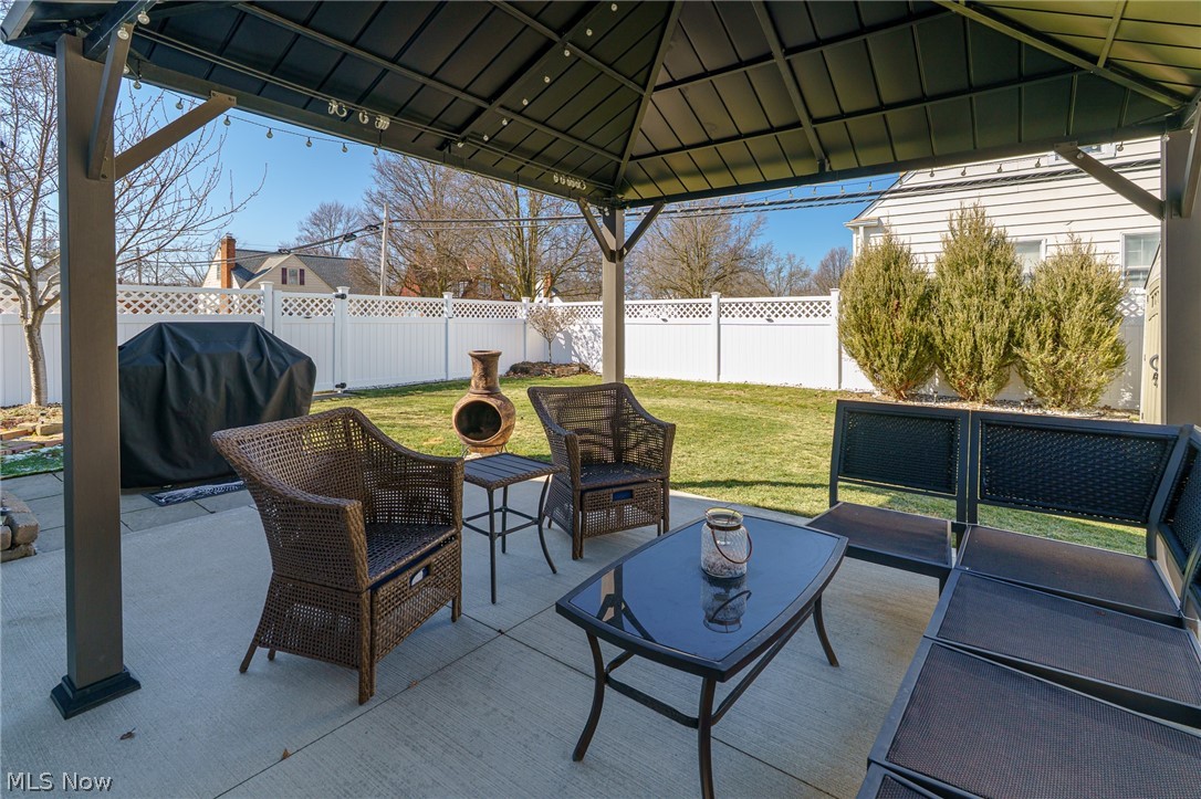 7462 Pearl Road Cleveland, OH 44130 - Photo 22 of 32 Another photo under gazebo with string lights. Patio furniture stays with the home
