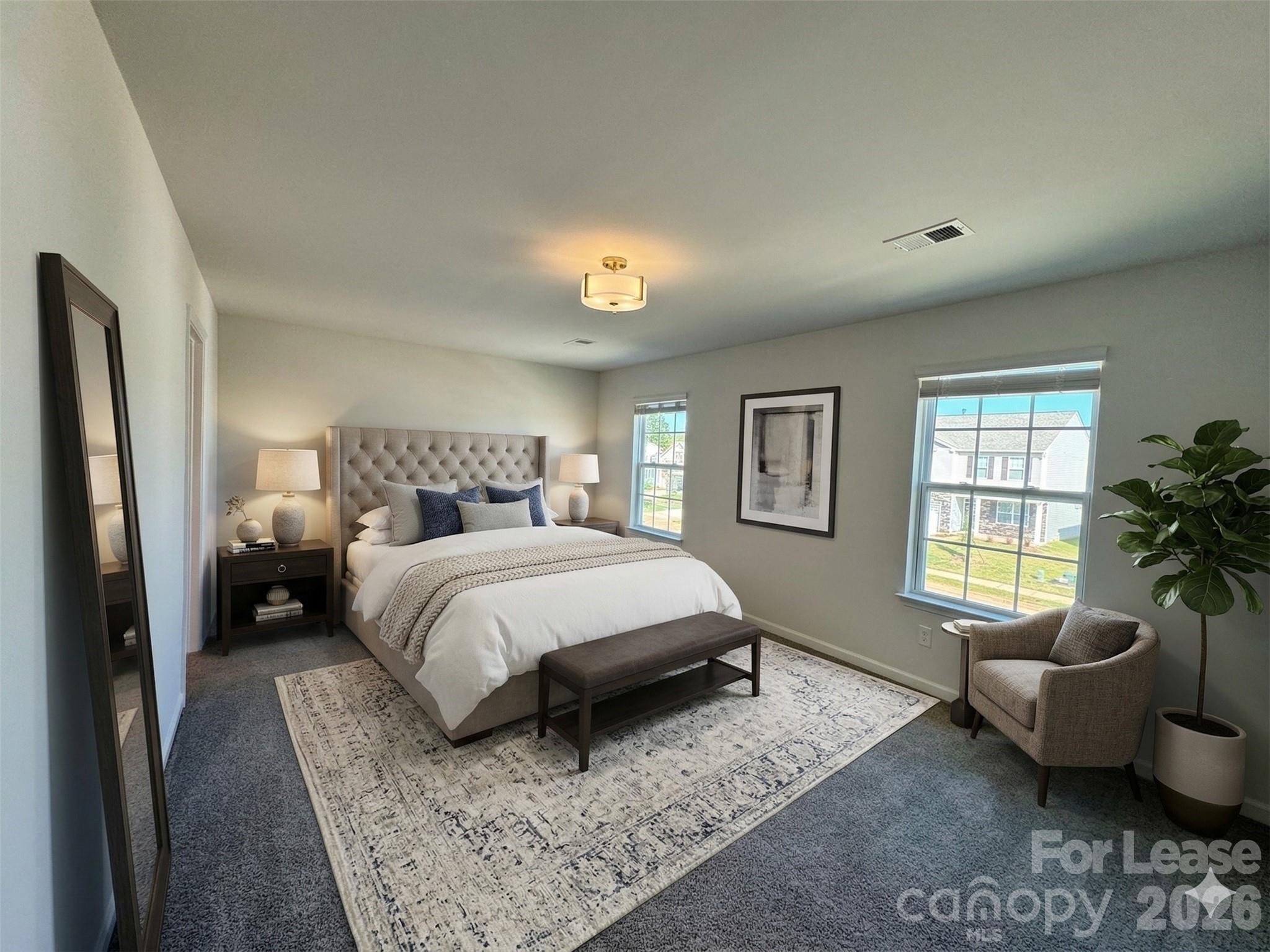 122 Old Home Road Statesville, NC 28677 - Photo 12 of 25 a spacious bedroom with a bed and a couch
