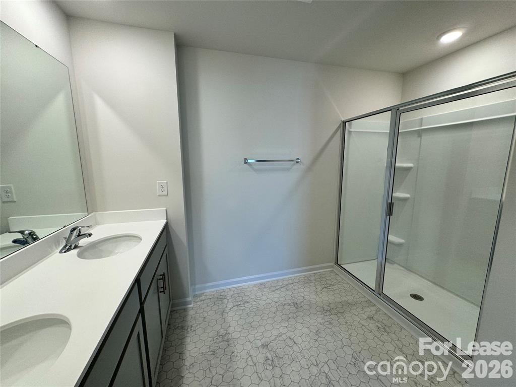 122 Old Home Road Statesville, NC 28677 - Photo 14 of 25 a bathroom with a sink and shower