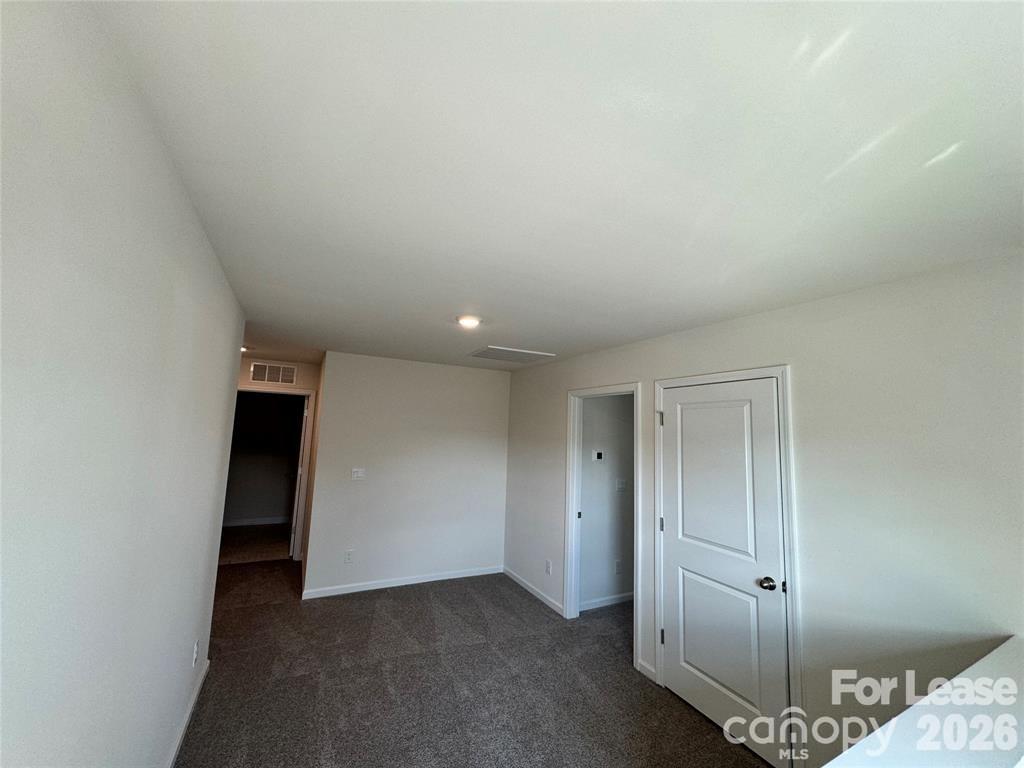122 Old Home Road Statesville, NC 28677 - Photo 16 of 25 an empty room with an entryway