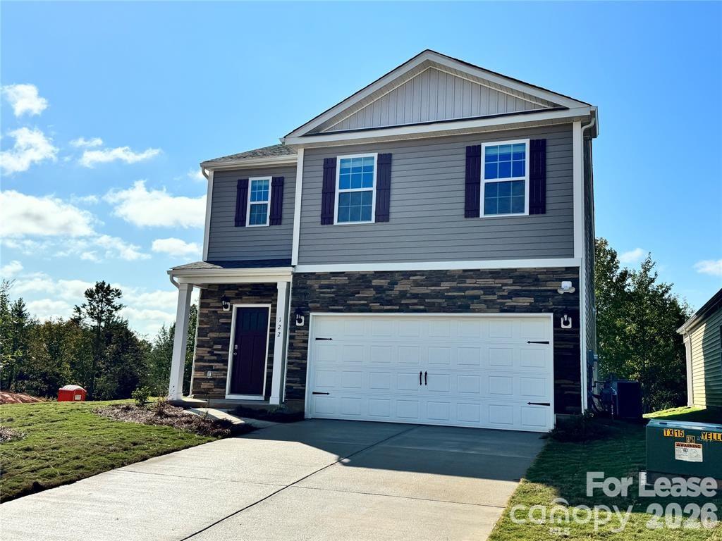 122 Old Home Road Statesville, NC 28677 - Photo 2 of 25 a front view of a house with a yard