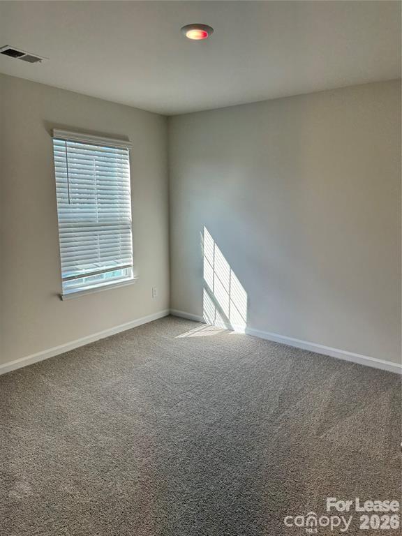 122 Old Home Road Statesville, NC 28677 - Photo 21 of 25 an empty room with a window