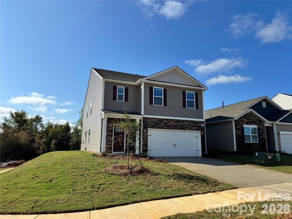 122 Old Home Road Statesville, NC 28677 - Photo 3 of 25 a front view of a house with a yard