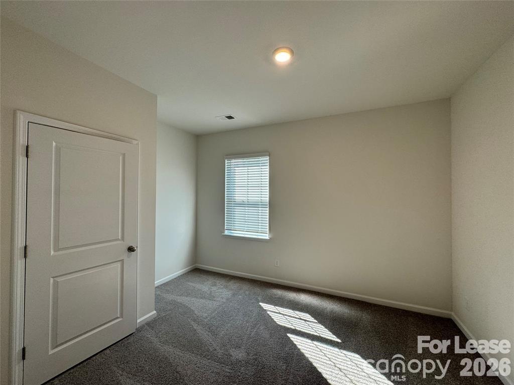 122 Old Home Road Statesville, NC 28677 - Photo 6 of 25 a view of an empty room and window