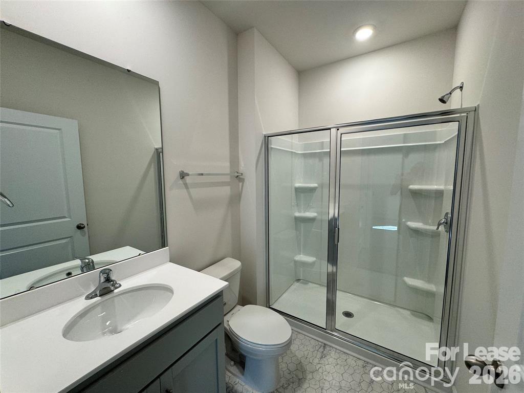 122 Old Home Road Statesville, NC 28677 - Photo 8 of 25 a bathroom with a sink toilet and shower