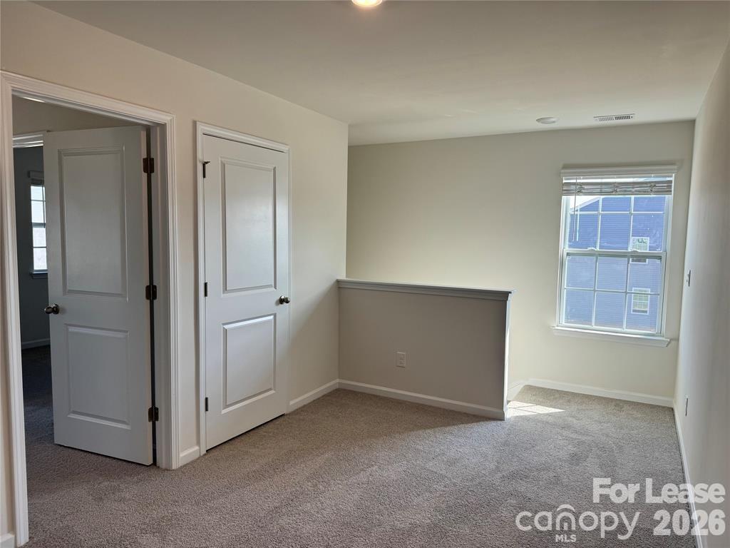 122 Old Home Road Statesville, NC 28677 - Photo 10 of 25 a view of an empty room and window