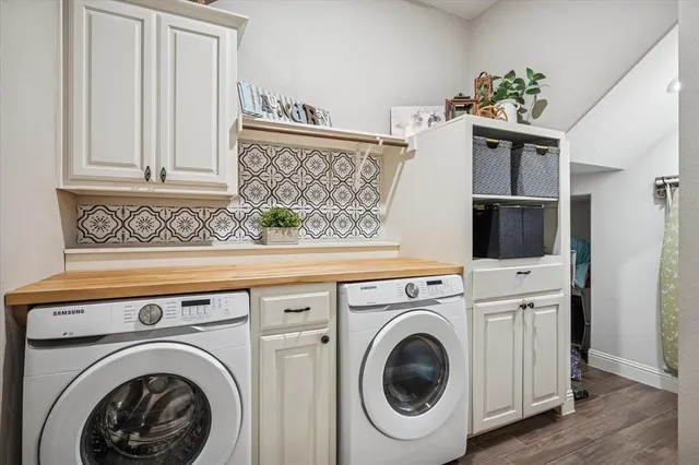 a utility room with dryer and washer