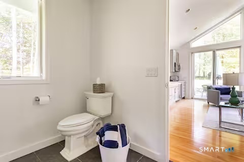9 Fall Ridge Road Weston, CT 06883 - Photo 32 of 39 Main floor includes spacious full bathroom with shower (in cottage)